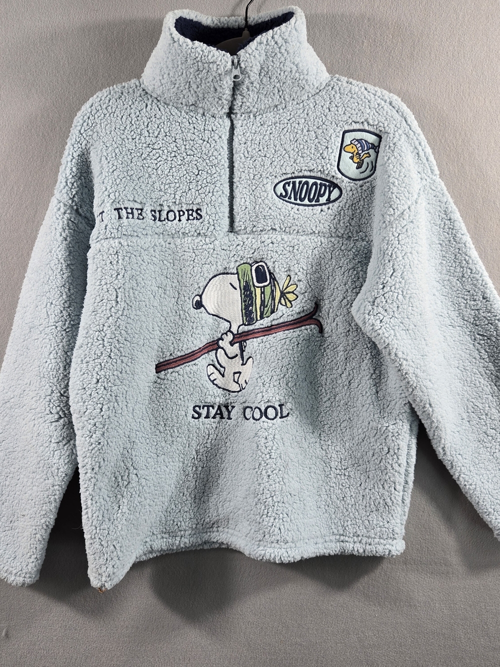 Peanuts Snoopy Skiing Sherpa Quarter Zip Fleece Light Blue Small